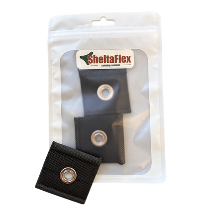 SheltaFlex Kederclips Set in Einzelverpackung mit schwarzem Kederclip und Metallöse, Ansicht links.
